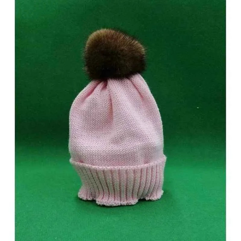 Cappellino artigianale bambino neonato in lana con ponpon in pelliccia 1657A