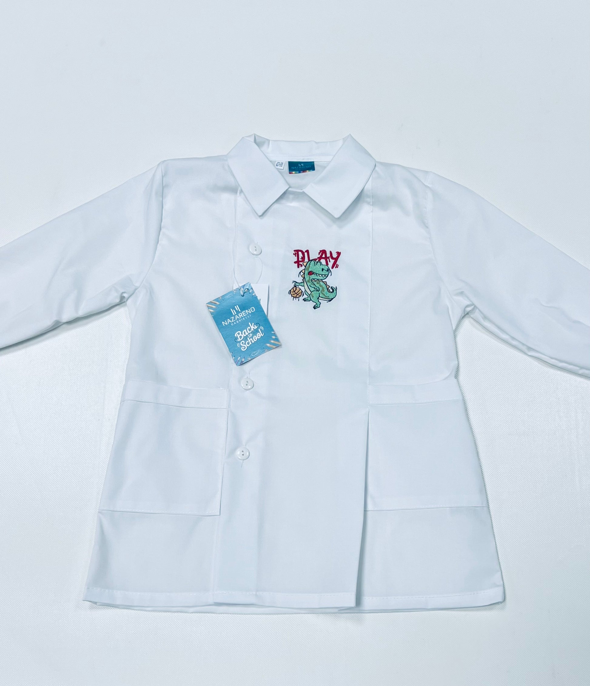 Grembiule Bianco asilo bambino con abbottonatura laterale Nazareno Gabrielli ricamo Dinosauro 0704