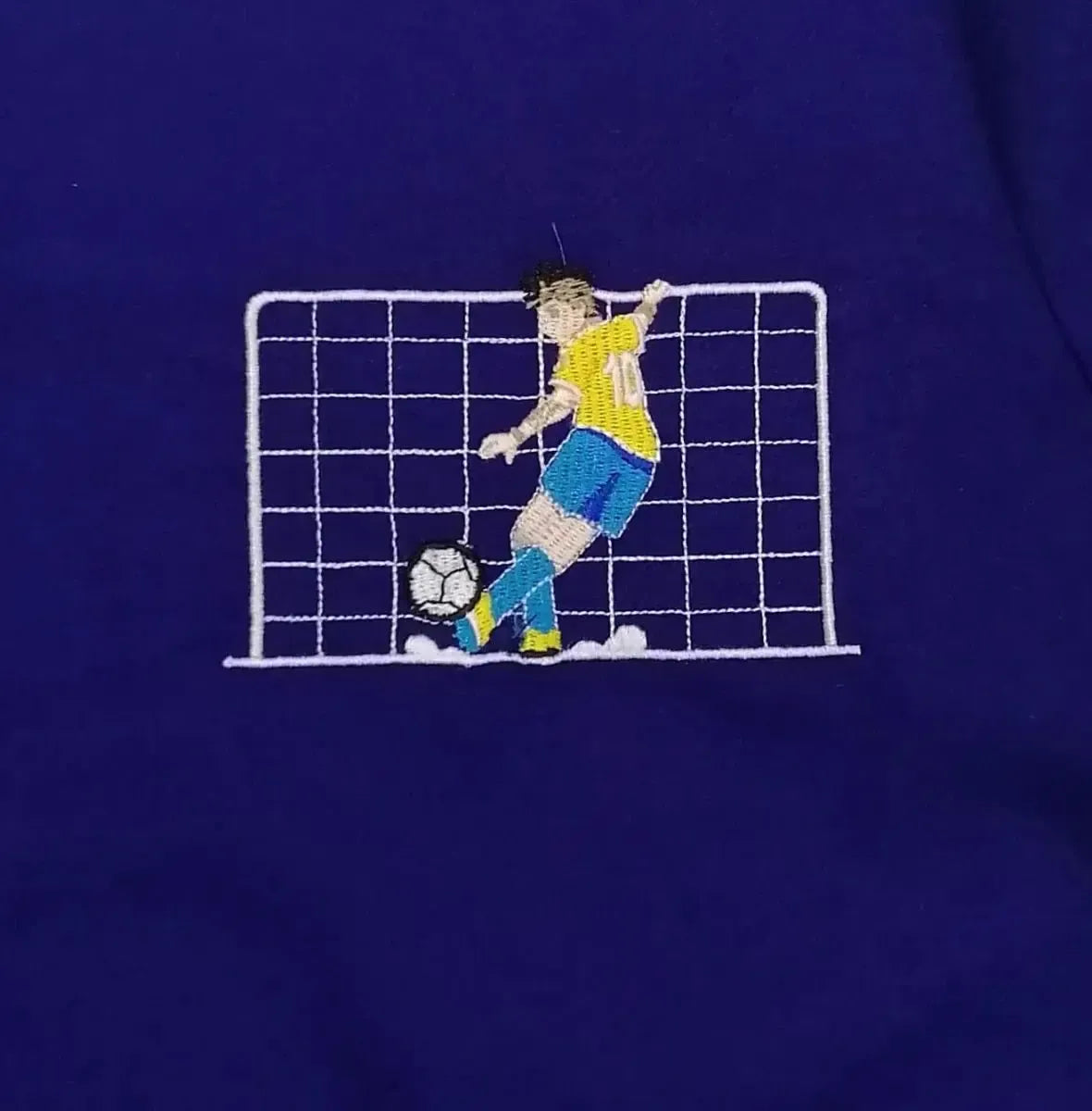 Grembiule Mariano scuola elementare bambino blu con abbottonatura laterale Calcio MN800