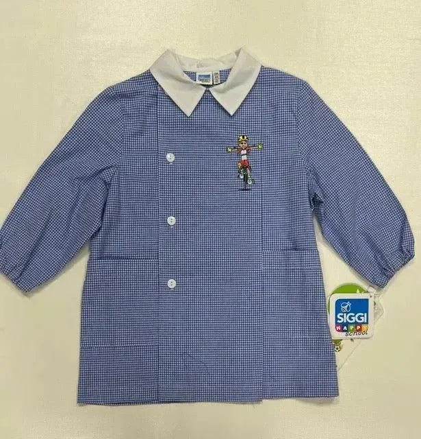 Grembiule asilo quadretti azzurri bambino con abbottonatura laterale Siggi ricamo Bici 3889