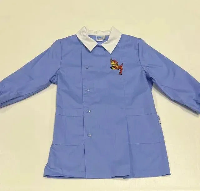 Grembiule con abbottonatura laterale scuola elementare celeste bambino Siggi Made in Italy ricamo Dinosauro 3928