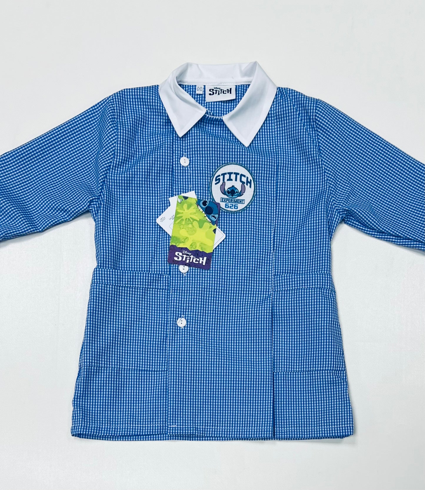 Grembiule quadretti azzurri asilo bambino con abbottonatura laterale Disney Stitch G307