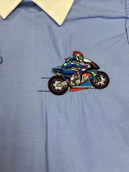 Grembiule scuola elementare bambino celeste con abbottonatura laterale Moto MN906
