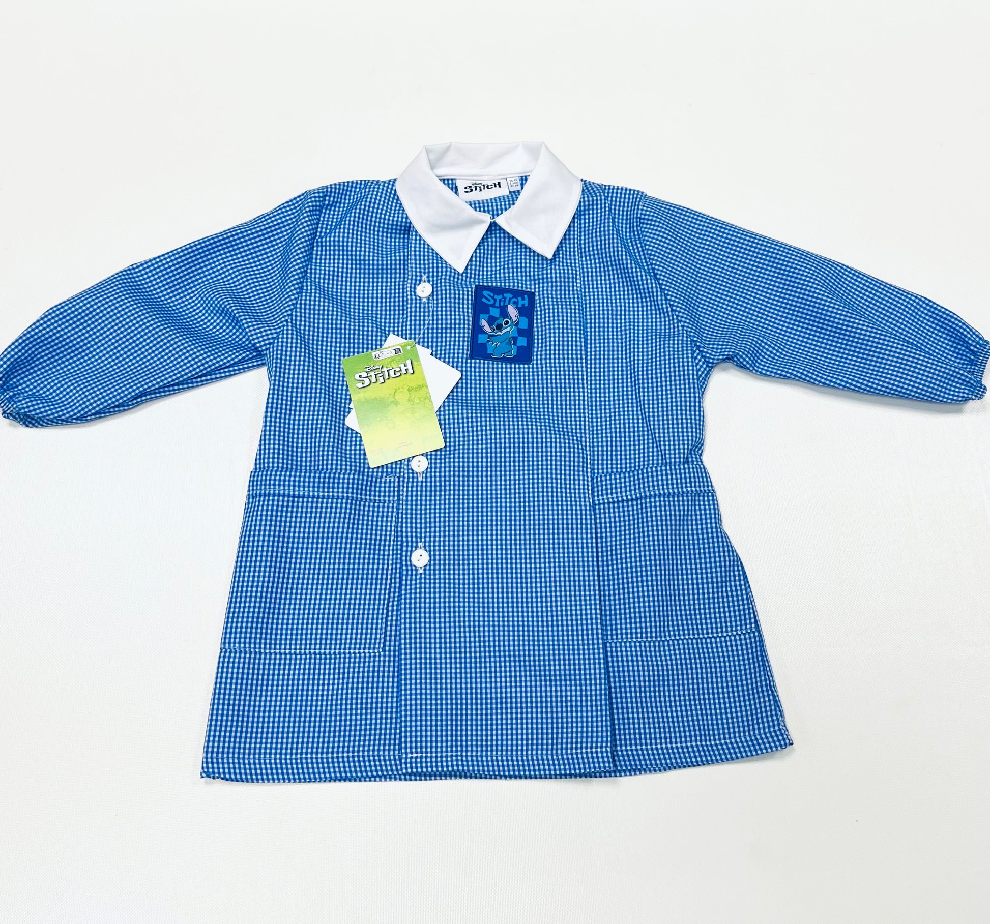 Grembiule quadretti azzurri asilo bambino con abbottonatura laterale Disney Stitch G307