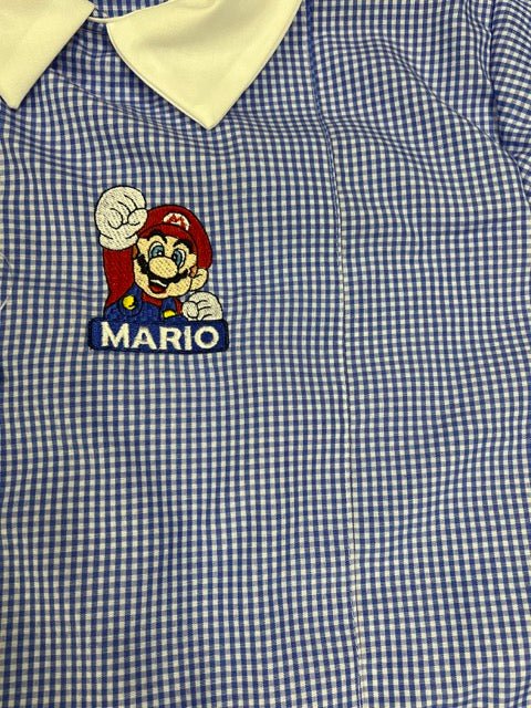 Grembiule quadretti azzurri asilo bambino con abbottonatura laterale Nintendo Super Mario Bros G304