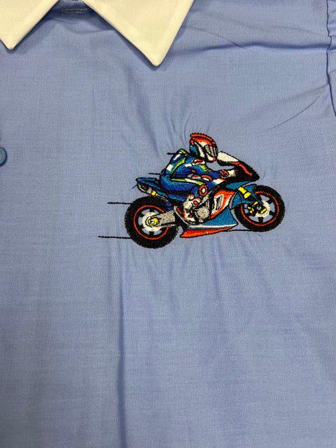 Grembiule scuola elementare bambino celeste con abbottonatura laterale Moto MN906